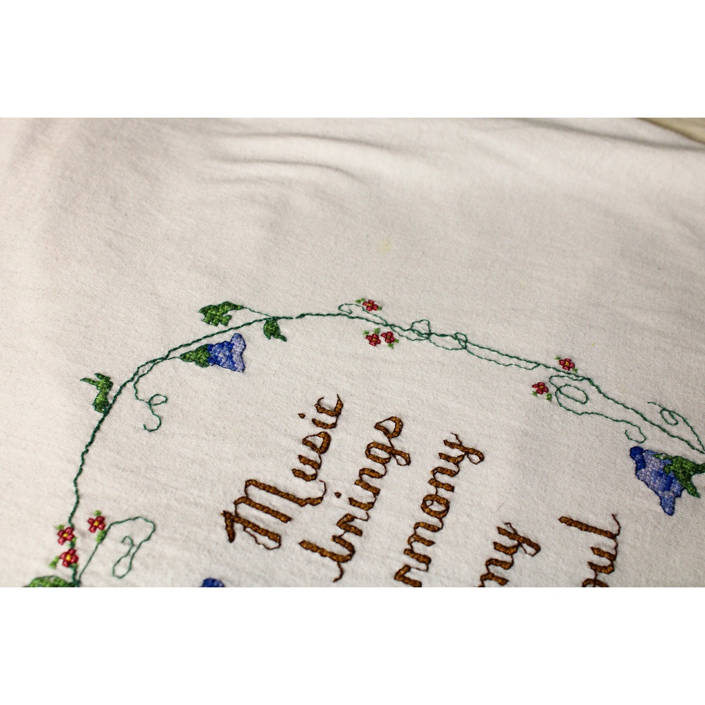 90s decosport mock-neck “music brings harmony”