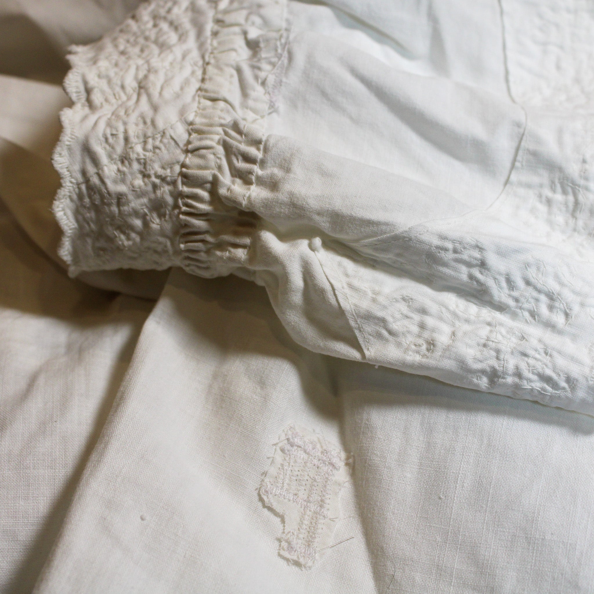 Antique white cotton nightgown with hand‑stitched cord embroidery