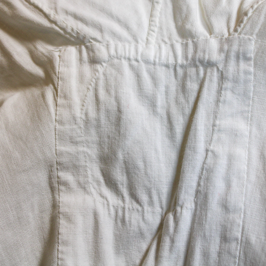Antique white cotton nightgown with hand‑stitched cord embroidery