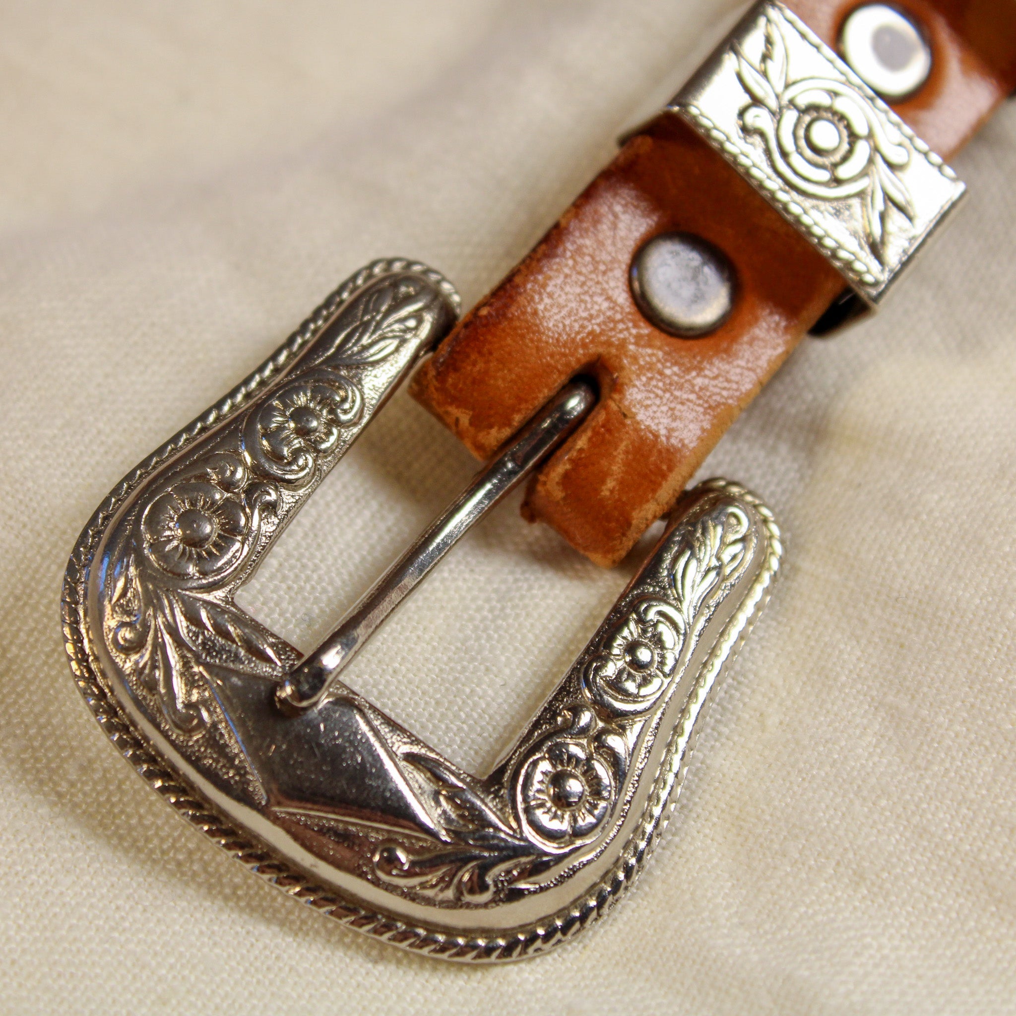 tooled leather belt w/ floral western buckle