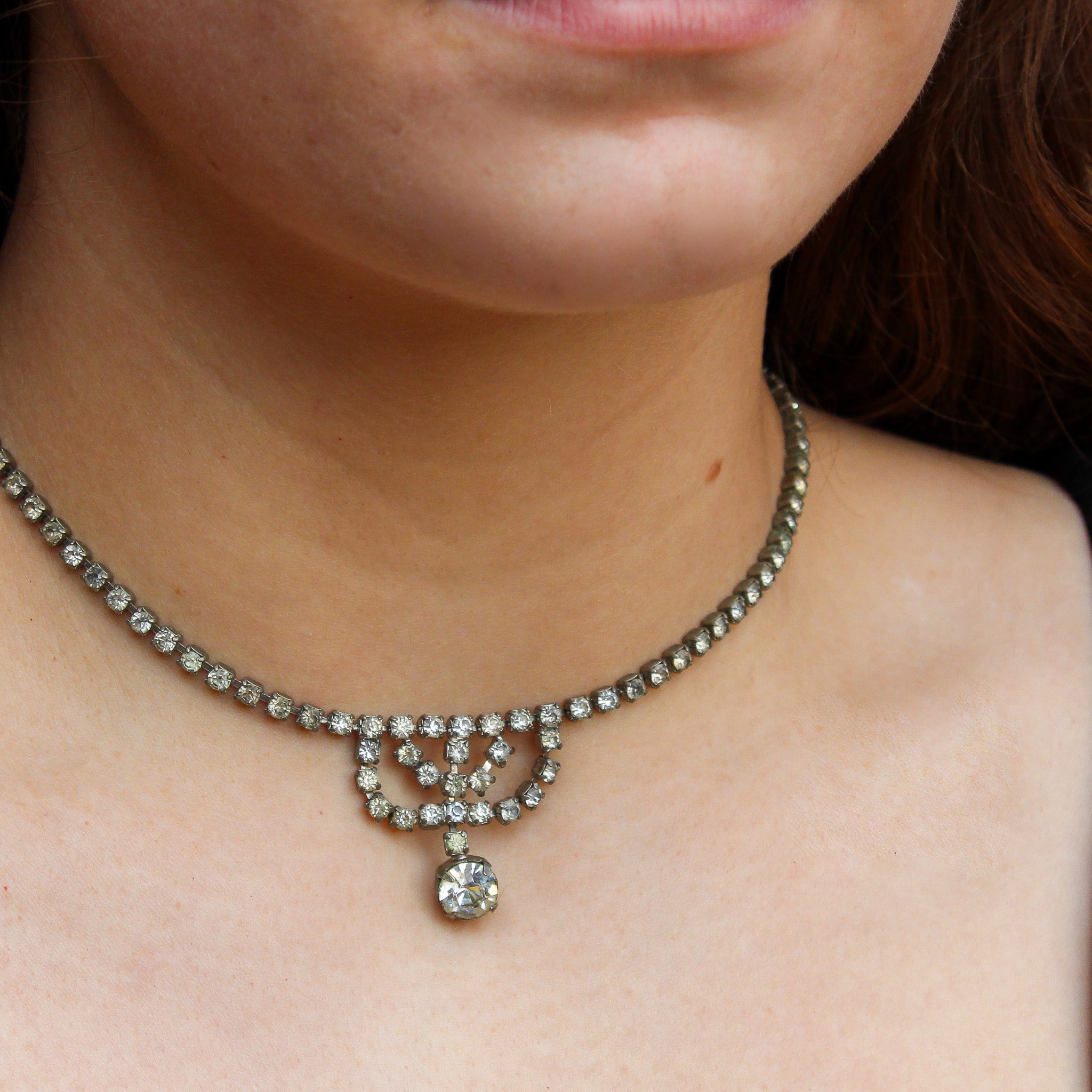 Detail view of rhinestone drop choker