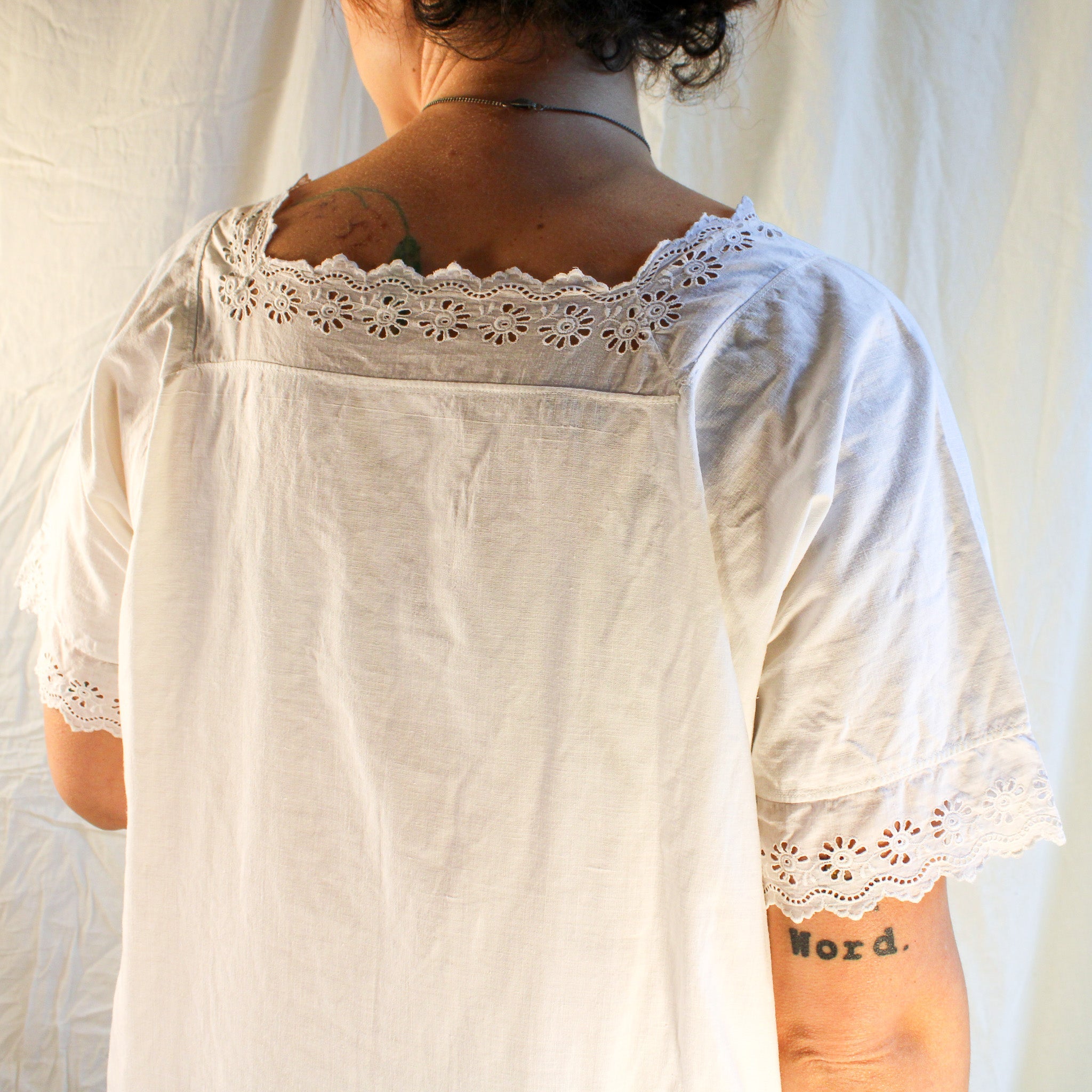 Antique cotton nightgown with square neck and daisy eyelet trim