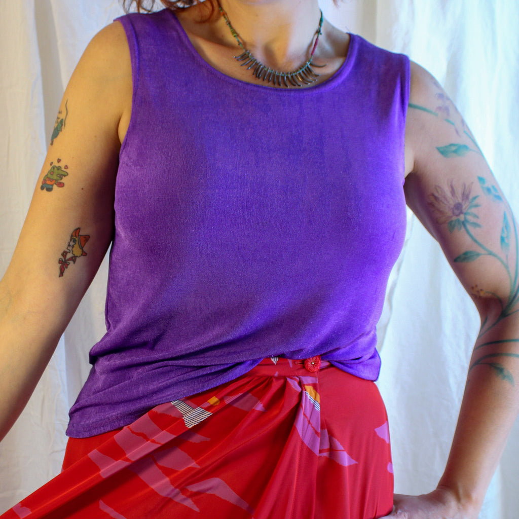 Front on model, slinky purple top