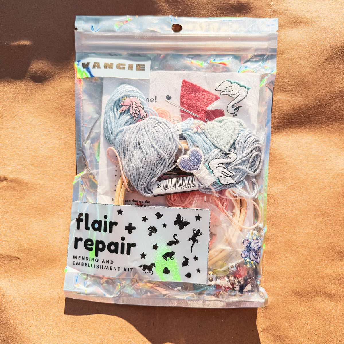 flair + repair kit for visible mending: swan song