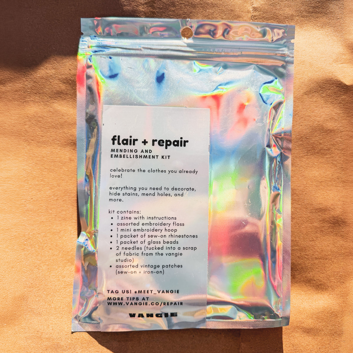 flair + repair kit for visible mending:  the cat's meow