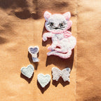 flair + repair kit for visible mending:  the cat's meow