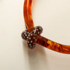 70s tortoiseshell lucite pavé knot collar necklace