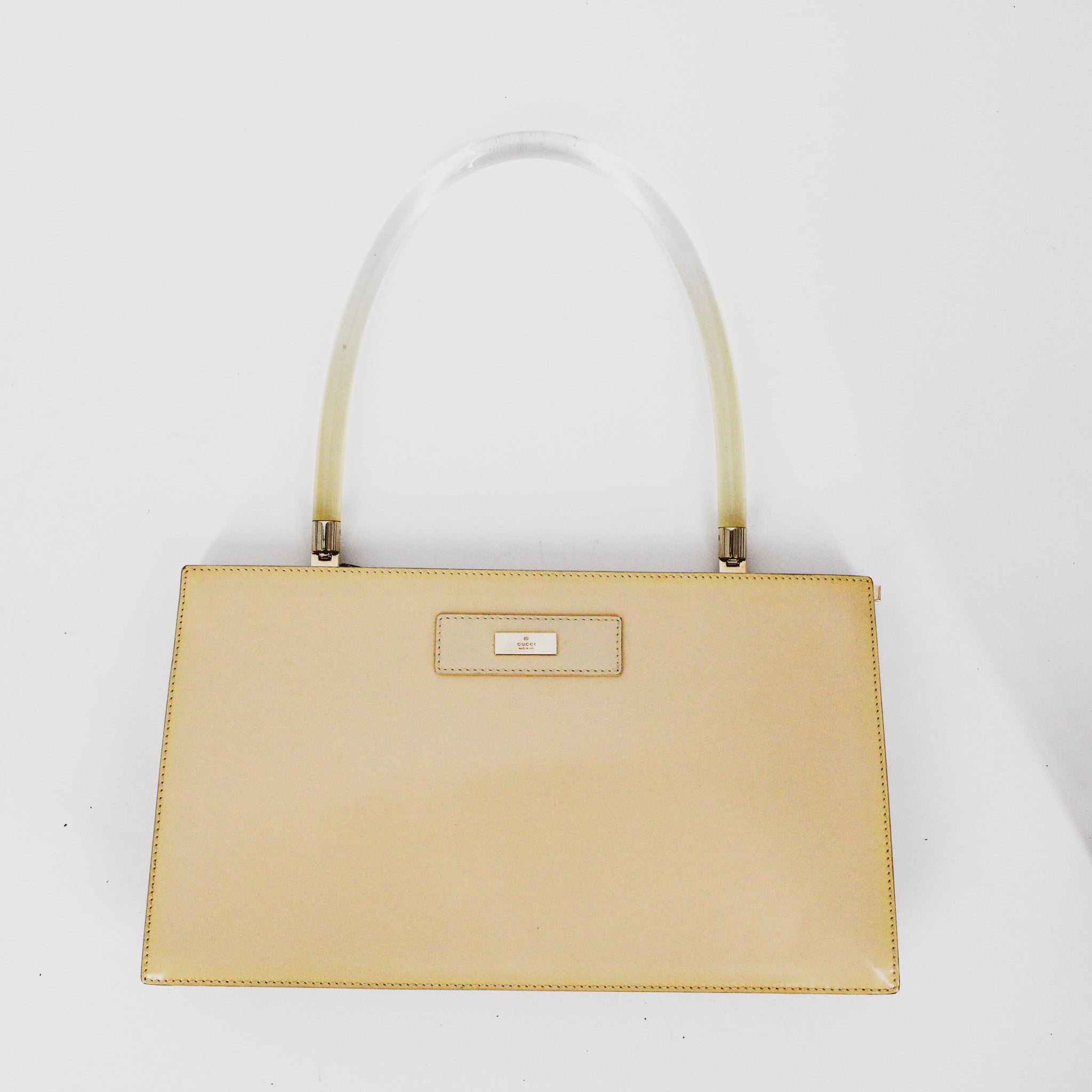 y2k gucci by tom ford tan patent leather, lucite handle