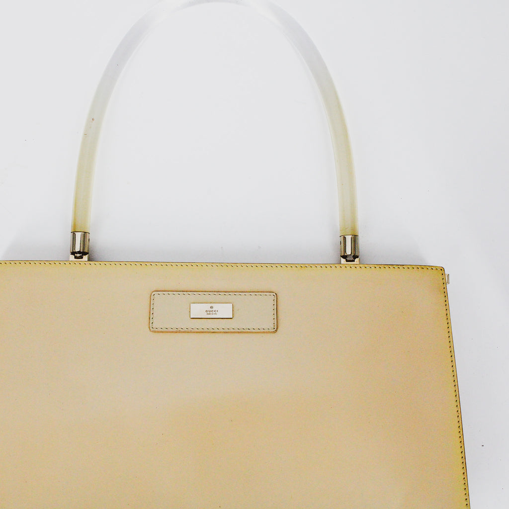 y2k gucci by tom ford tan patent leather, lucite handle