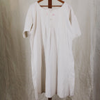 antique linen chemise, hand-monogrammed with mother-of-pearl buttons