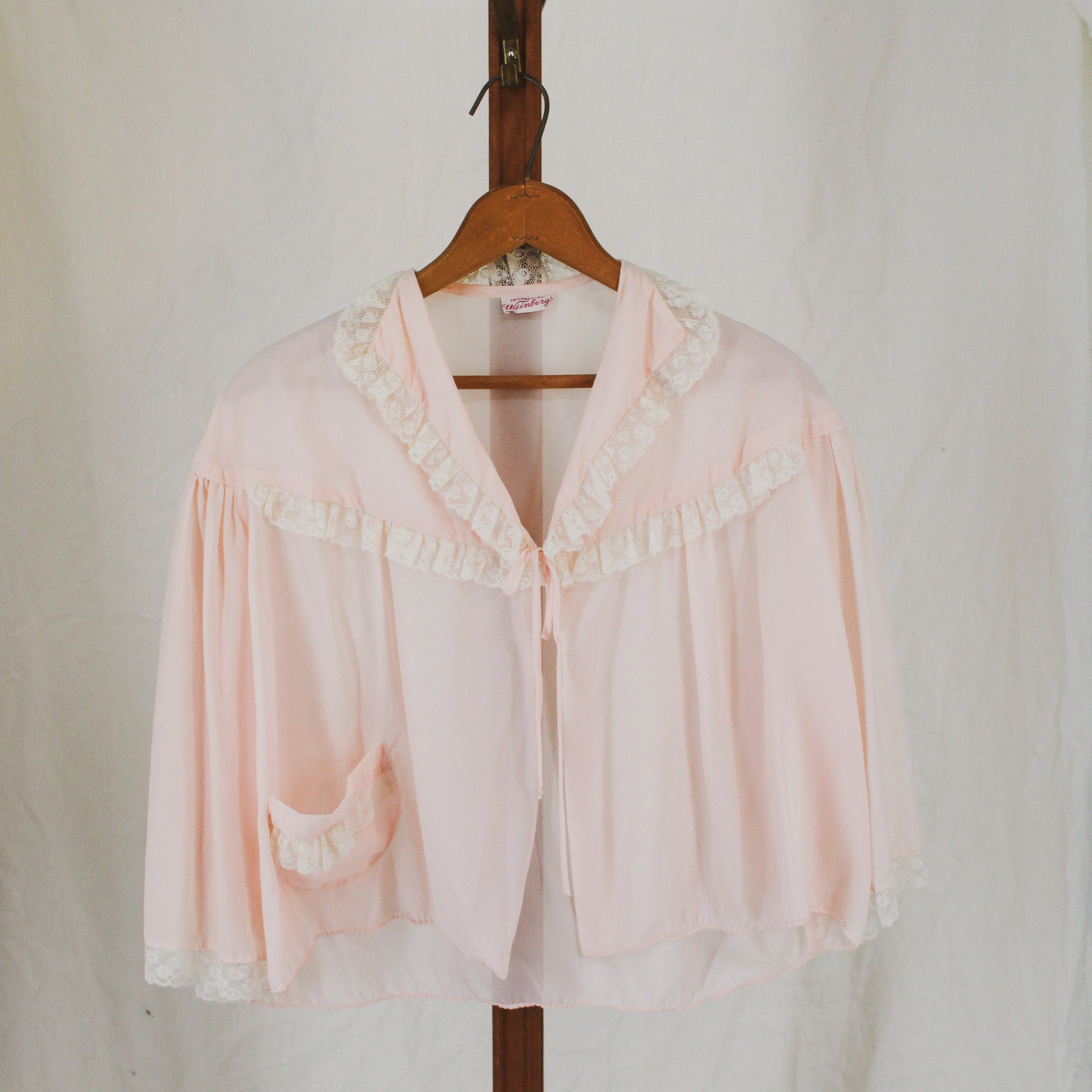 1950s sheer pink nylon bed jacket, lace trim, tailored by weinberg's