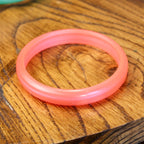 60s pink translucent bangle 2 3/4 inch diameter