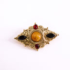 80s byzantine revival brooch - amber cabochon and jewel-tone glass