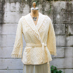 60s rhapsody by glazier ivory quilted bed jacket - back view on dress form