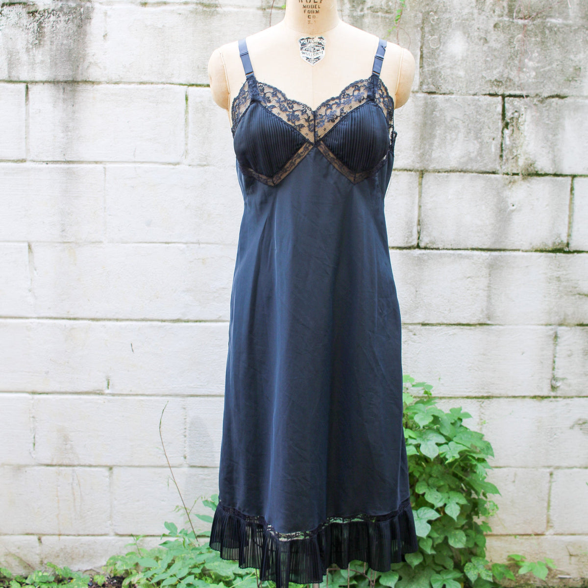 70s barbizon black satin slip - front full length on dress form