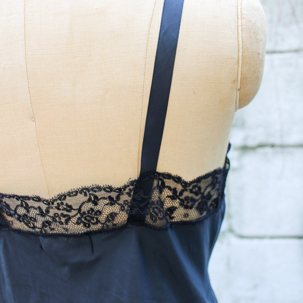 70s barbizon black satin slip - back strap and hem lace detail