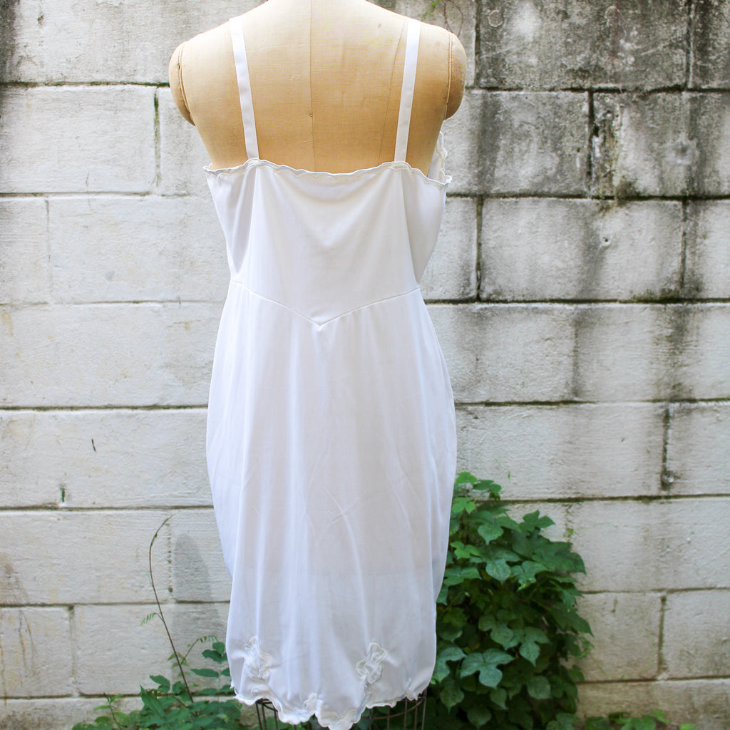 50s artemis white nylon slip - front bust detail on dress form