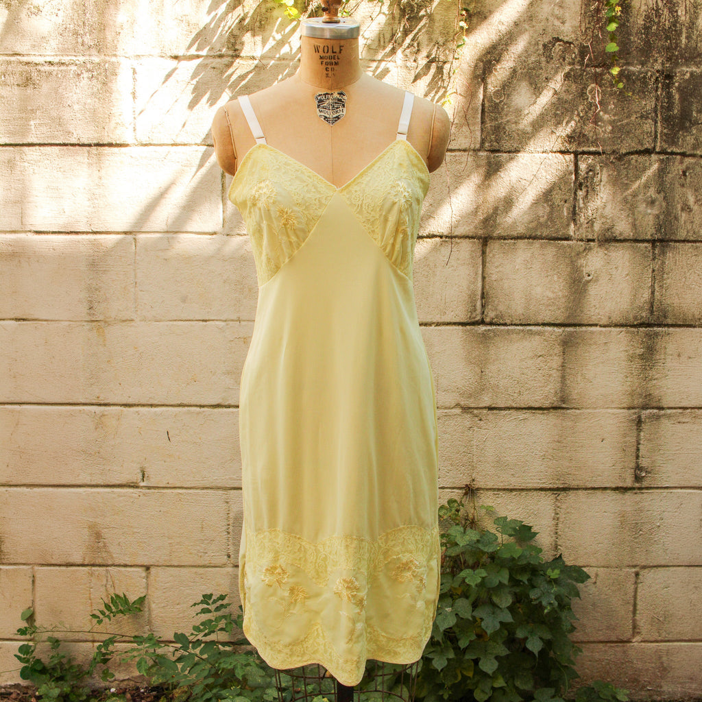 50s nan flower yellow nylon slip - front full length on dress form