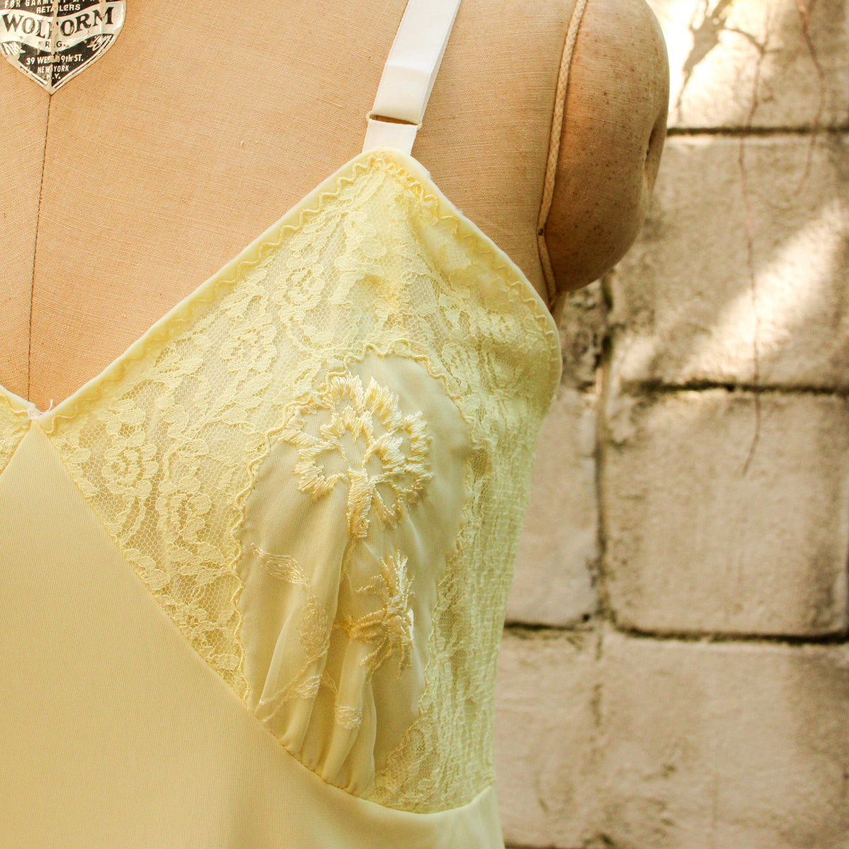 50s nan flower yellow nylon slip - back full length on dress form