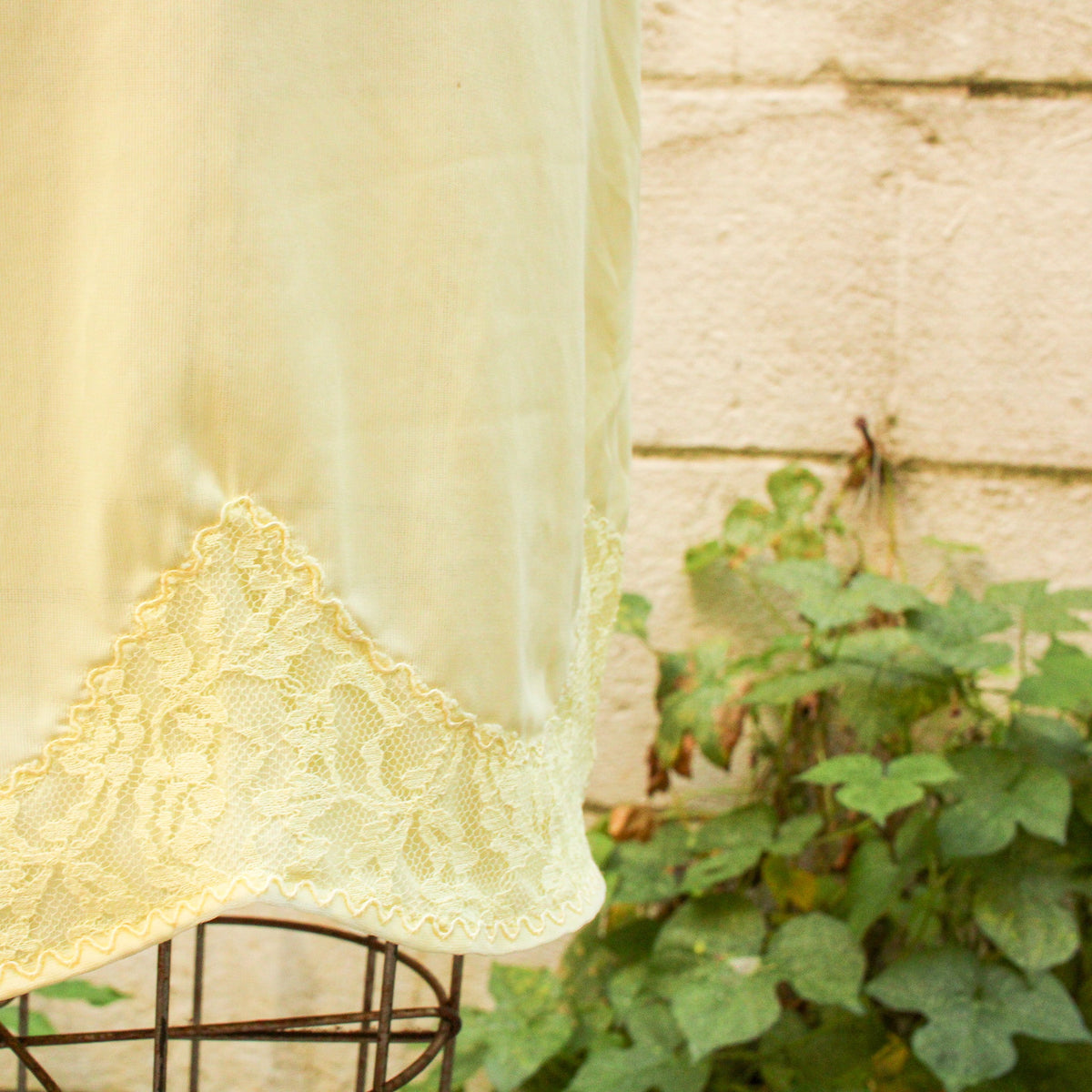 50s nan flower yellow nylon slip - strap and side seam detail