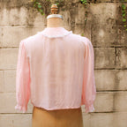 50s eastern isles pink chiffon bed jacket - back view on dress form