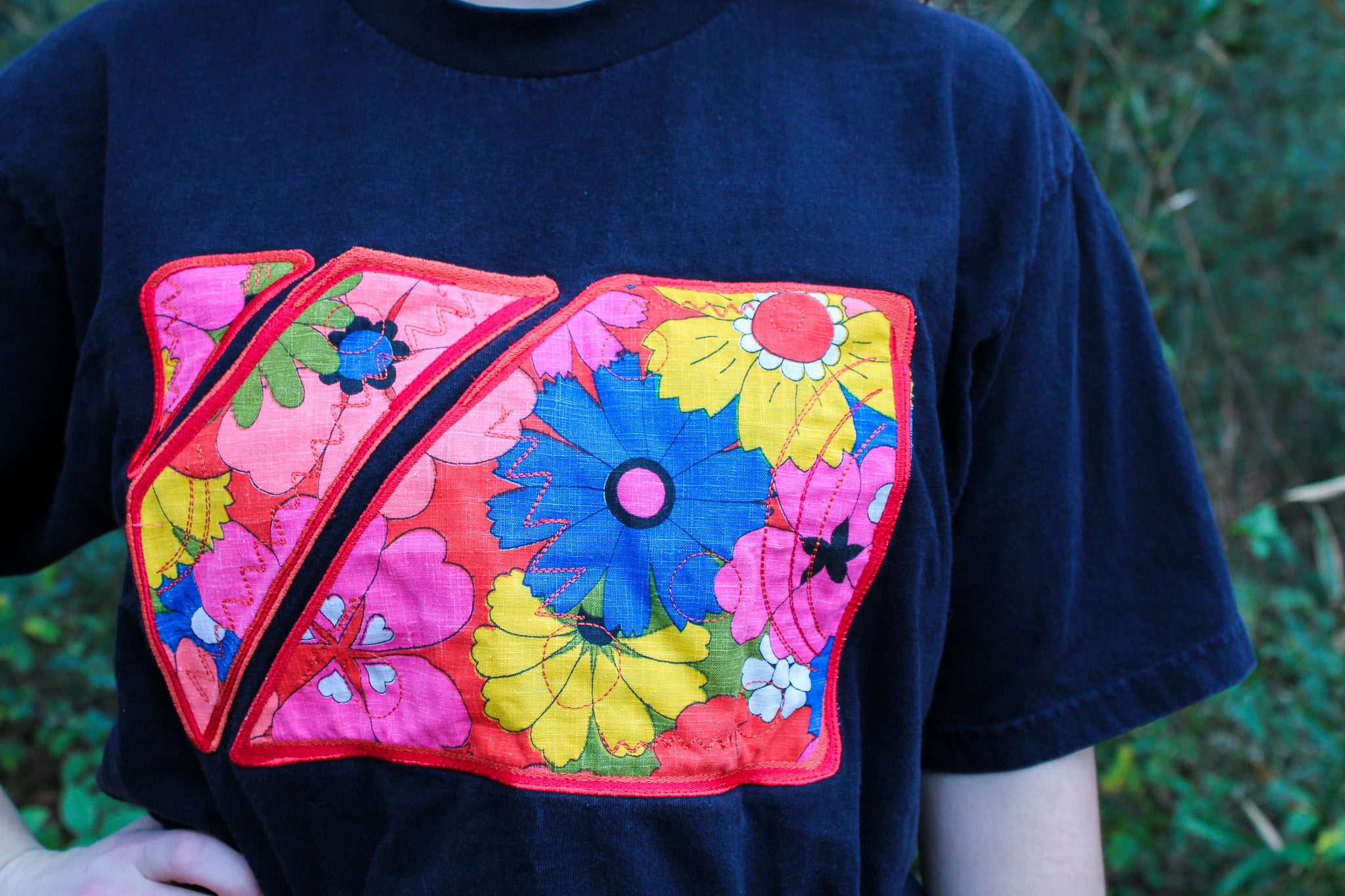 60s floral textile appliqué black tee - one-of-a-kind rework