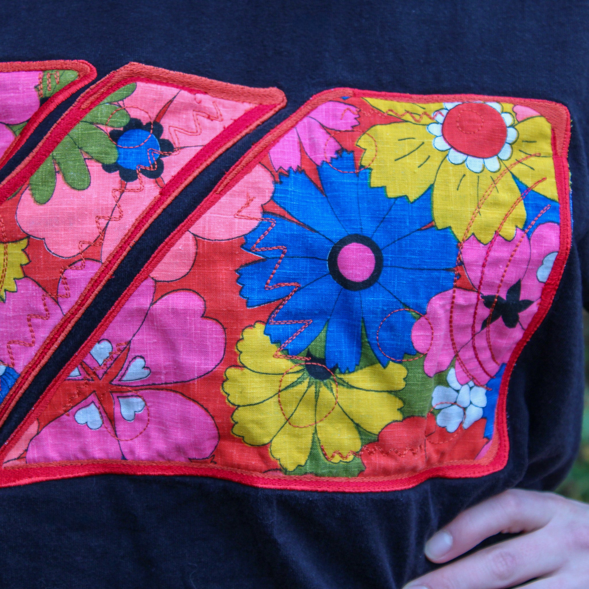 60s floral textile appliqué black tee - one-of-a-kind rework