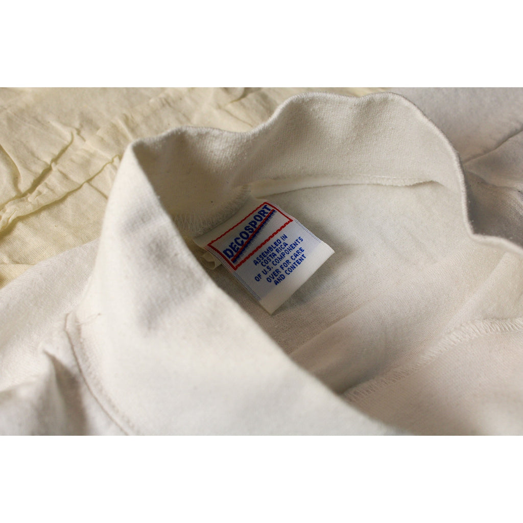 90s decosport mock-neck “music brings harmony”