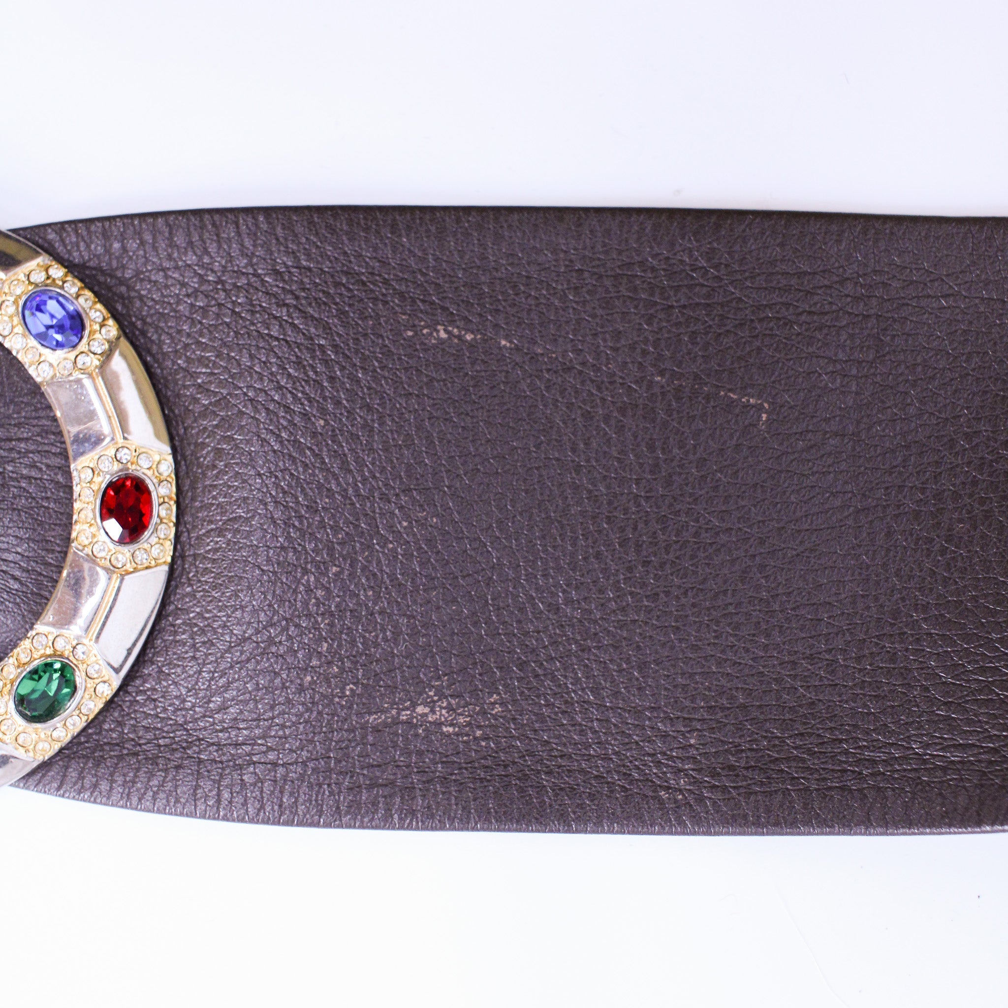 leather surface showing scuffing and wear