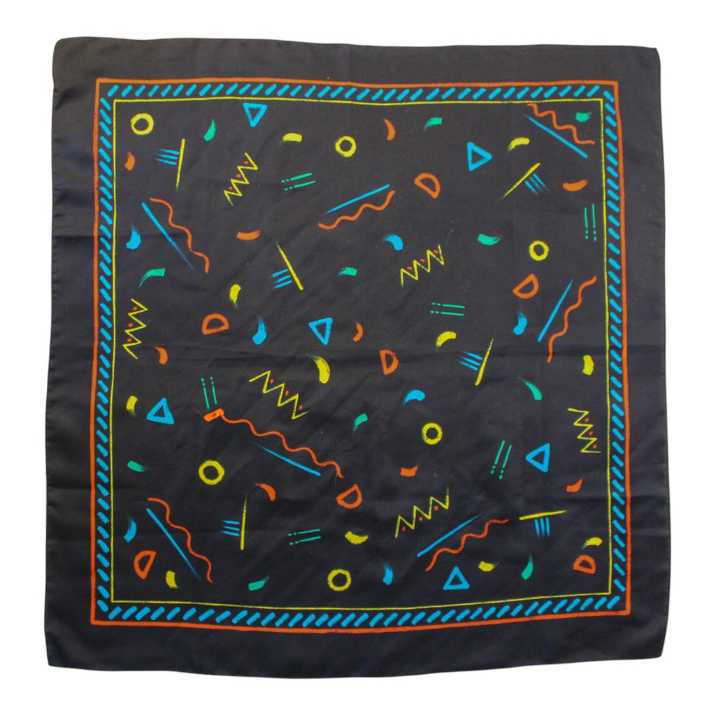 Front view of black Memphis-print scarf