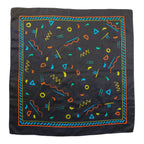 Front view of black Memphis-print scarf