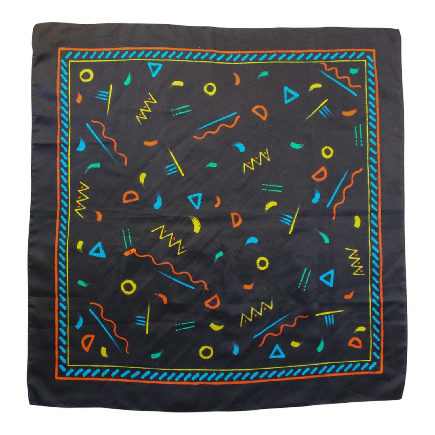 Front view of black Memphis-print scarf