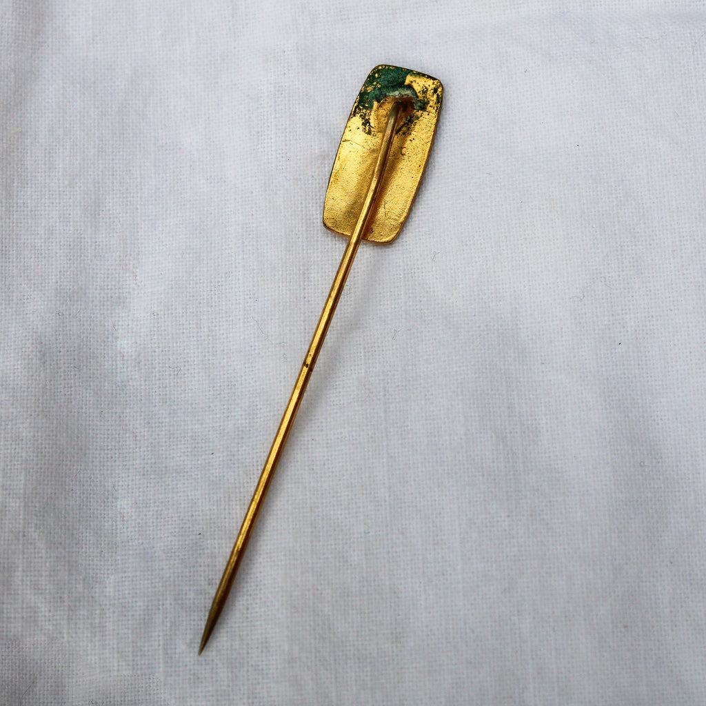 Front view of 60s brass art nouveau lady stick pin