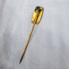 Front view of 60s brass art nouveau lady stick pin