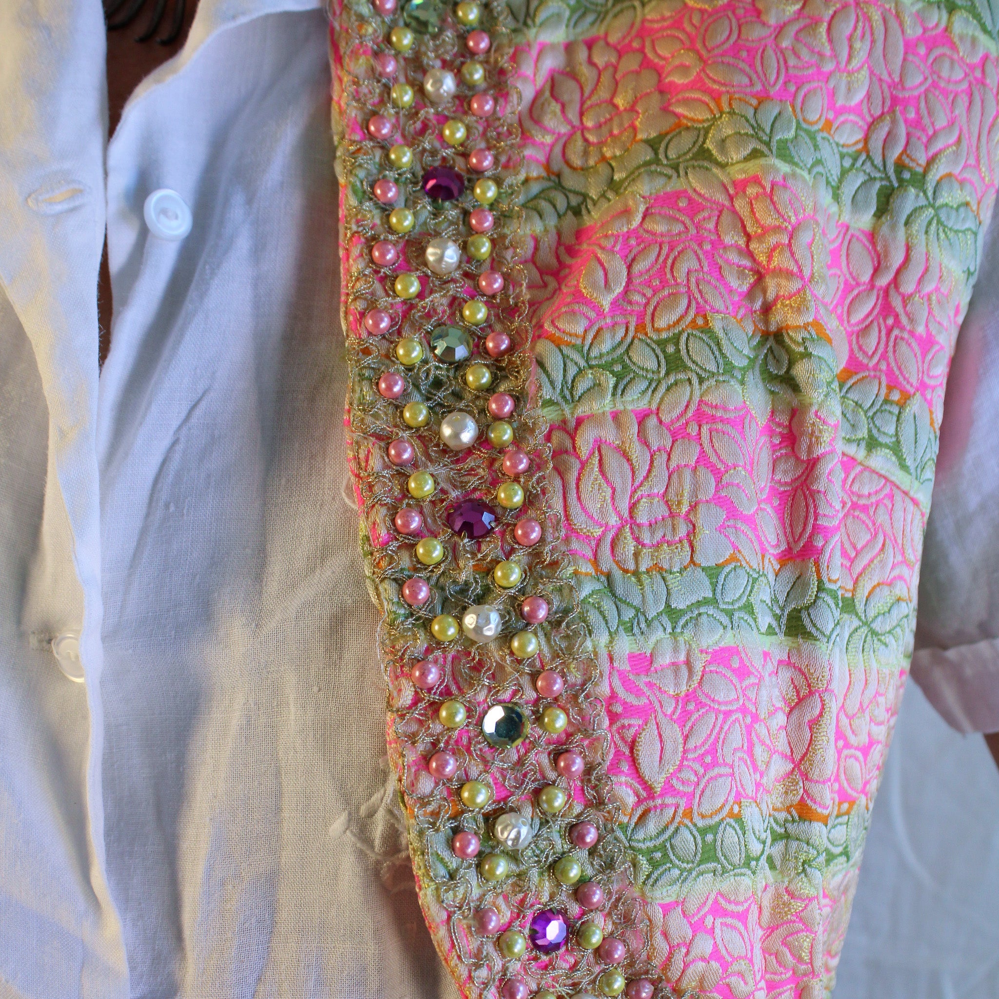 Close-up beaded trim pastel gems