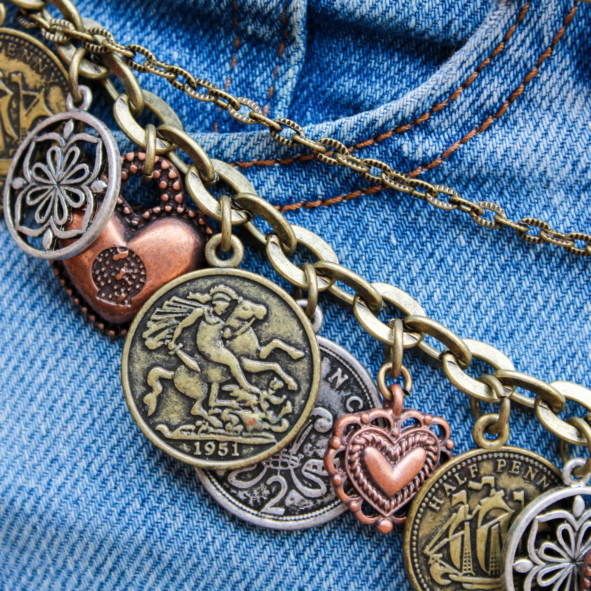 Front view of 90s coin charm belt styled on jeans