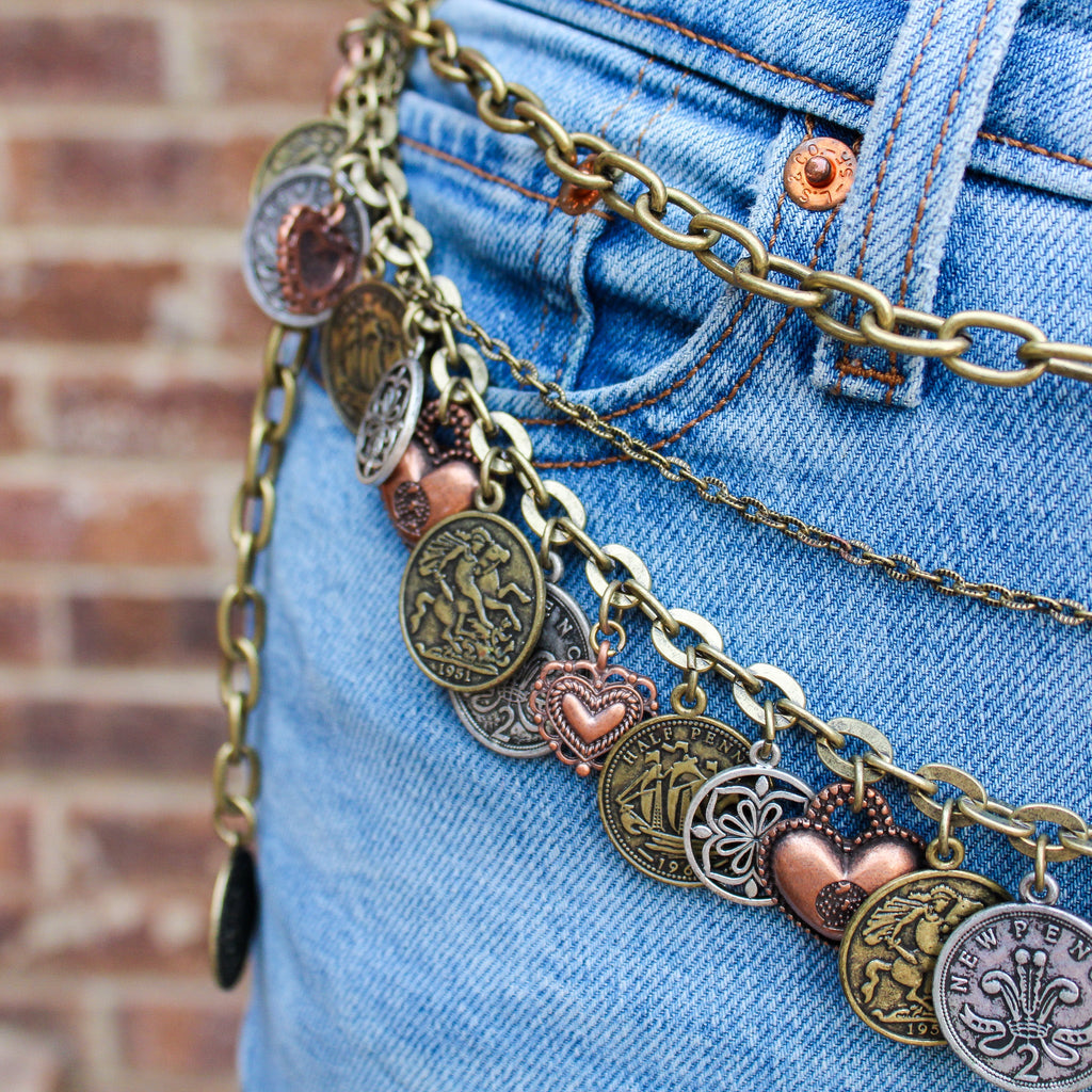 Detail of charms on 90s coin belt