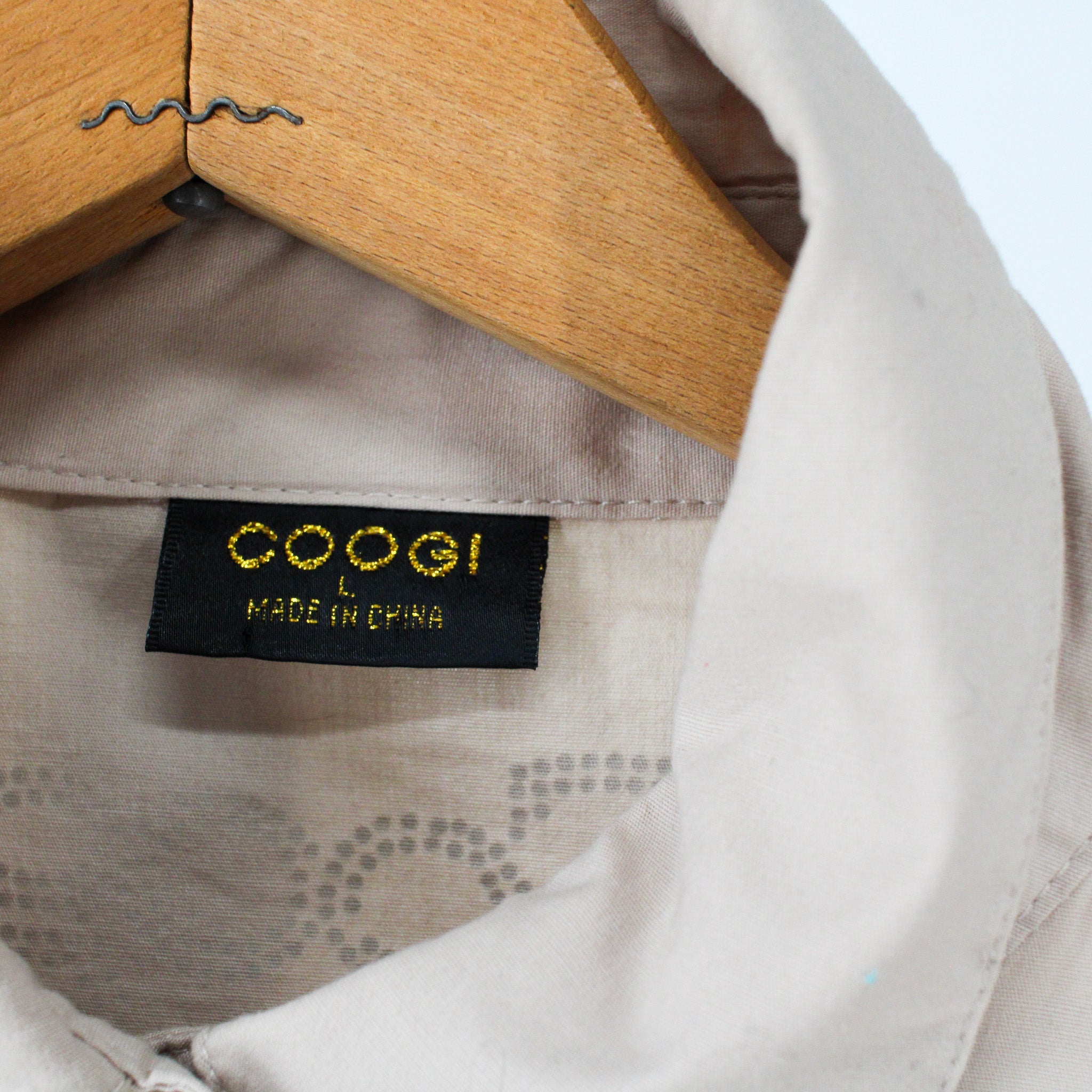 gold rhinestone coogi logo on chest detail