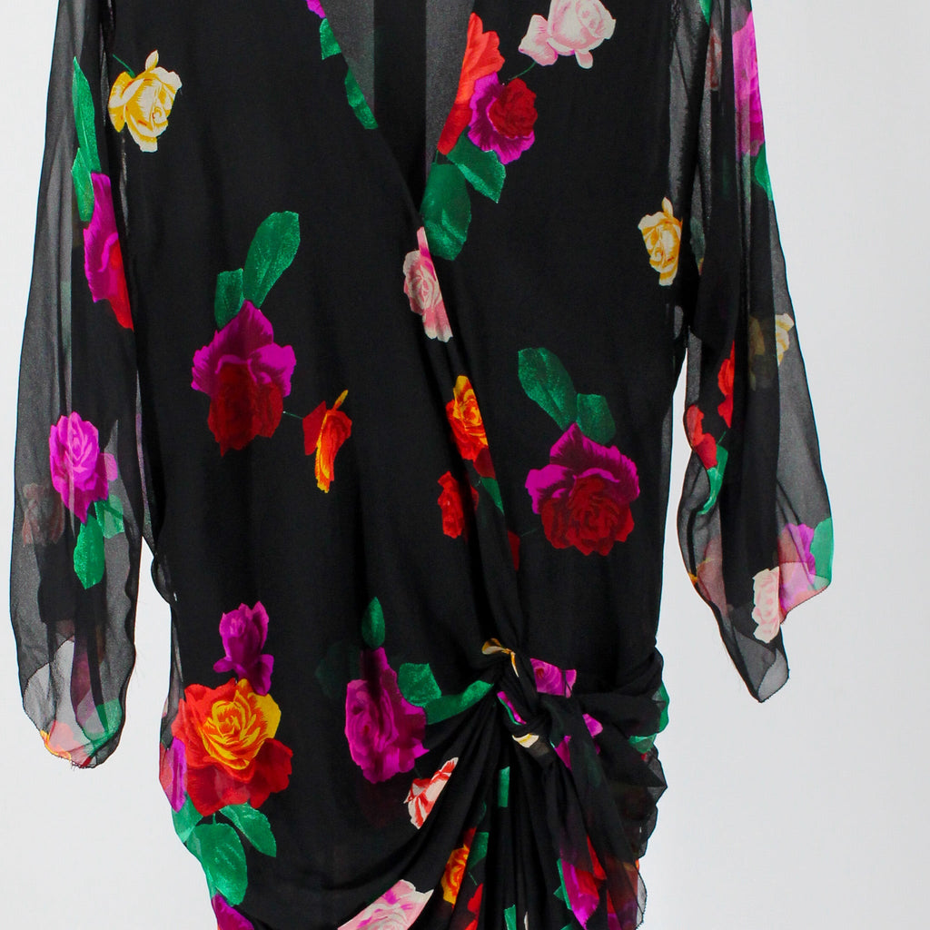 wrap bodice and knotted sarong drape detail