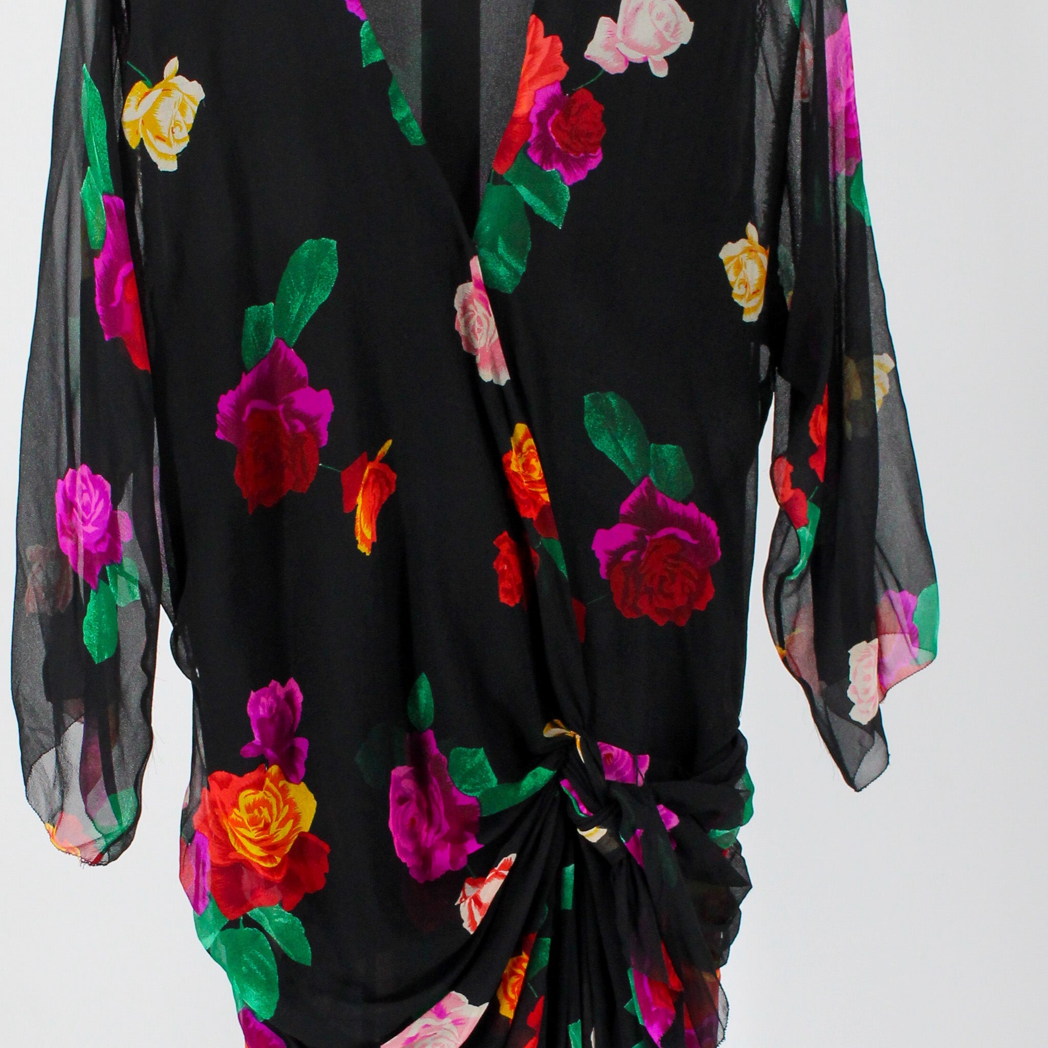 wrap bodice and knotted sarong drape detail
