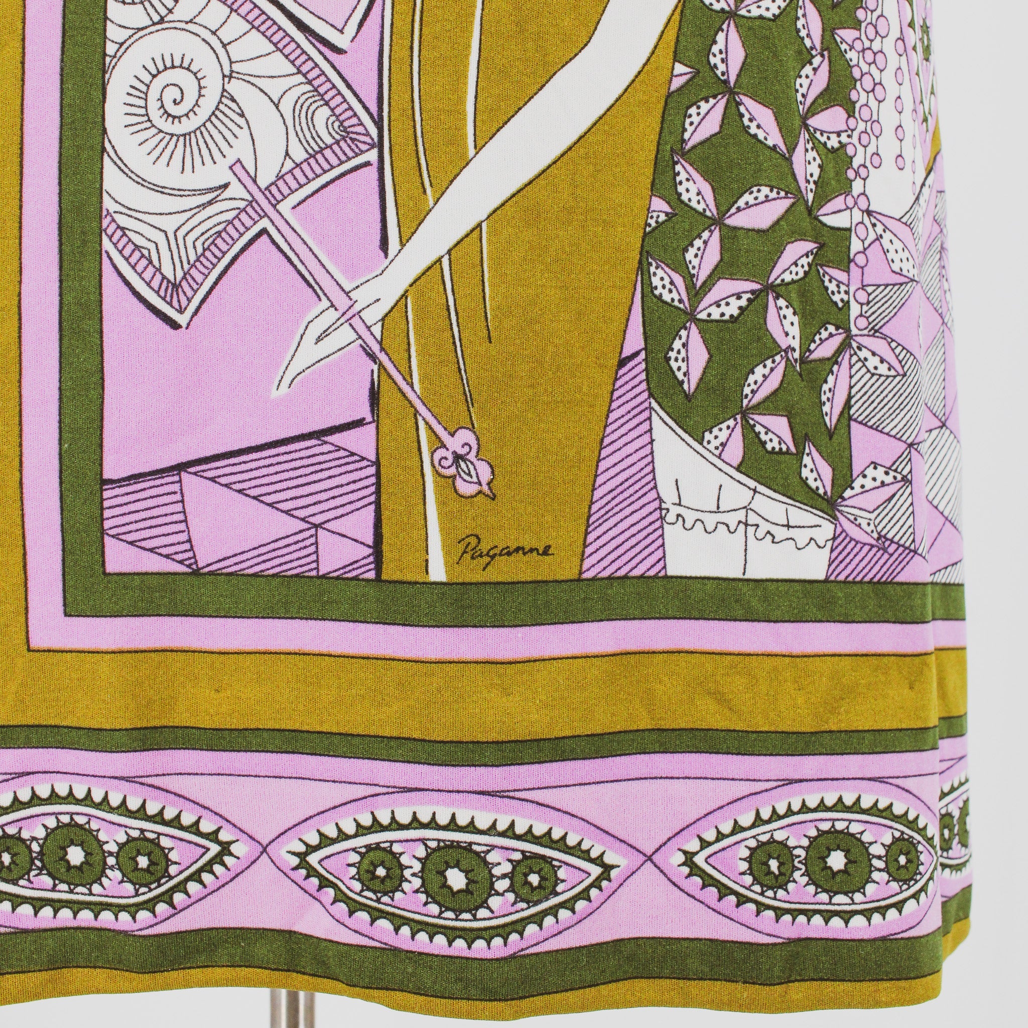 paganne signature printed in the design near the hem