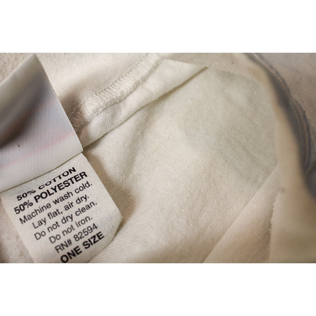 90s decosport mock-neck “music brings harmony”