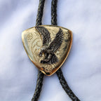 Close up of 70s brass eagle bolo tie slide