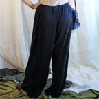 Back view black plissé pants