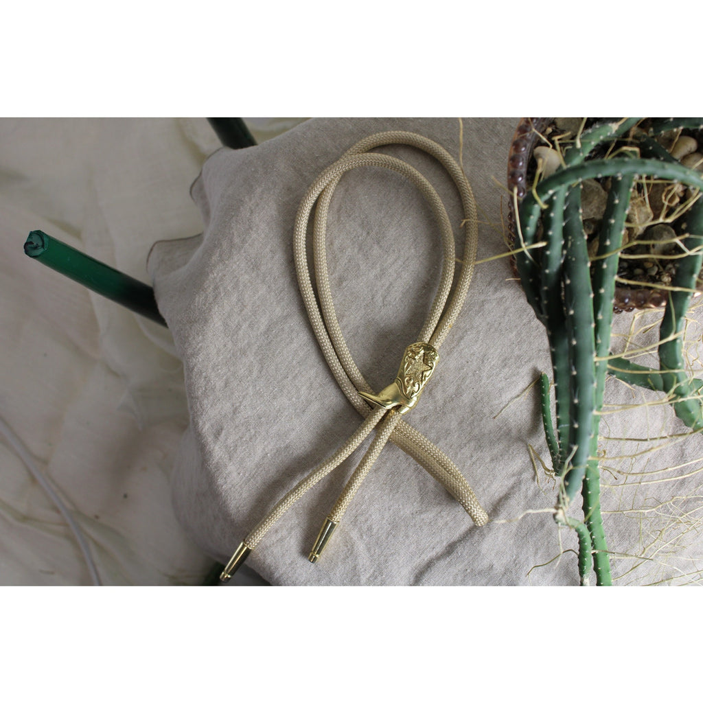 80s gold cowboy boot bolo tie