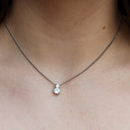 Front view of Givenchy crystal pendant necklace