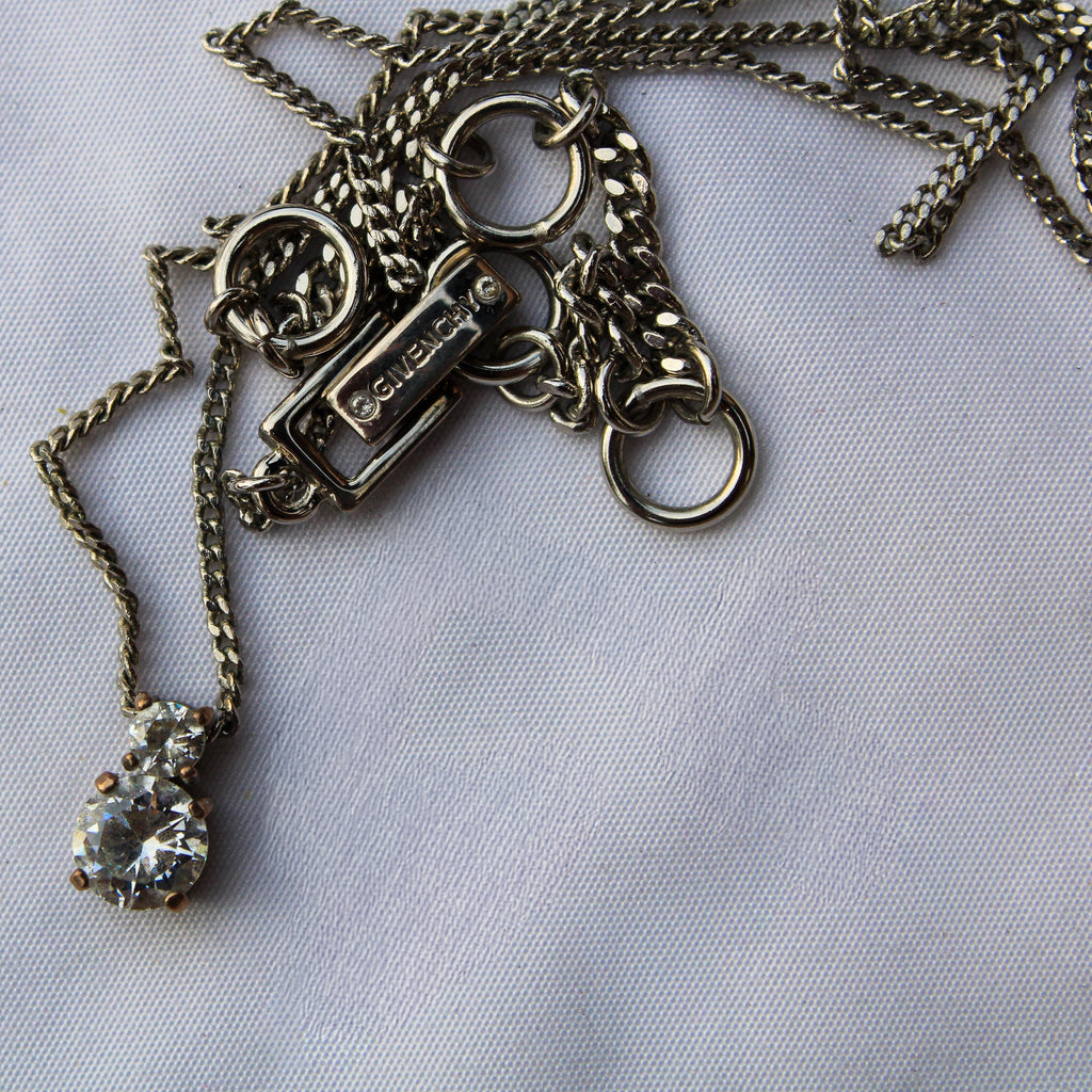 Detail view of Givenchy pendant