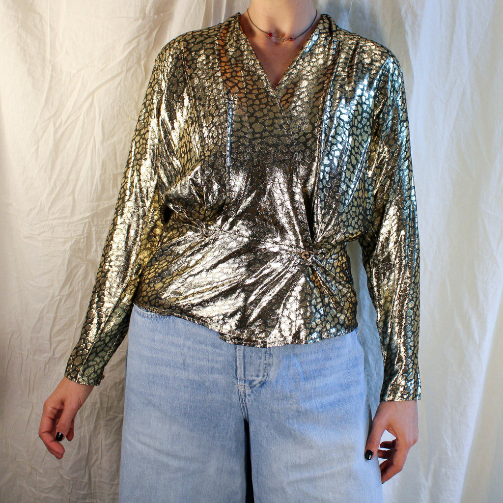 Front on model metallic gold foil ruched ring top
