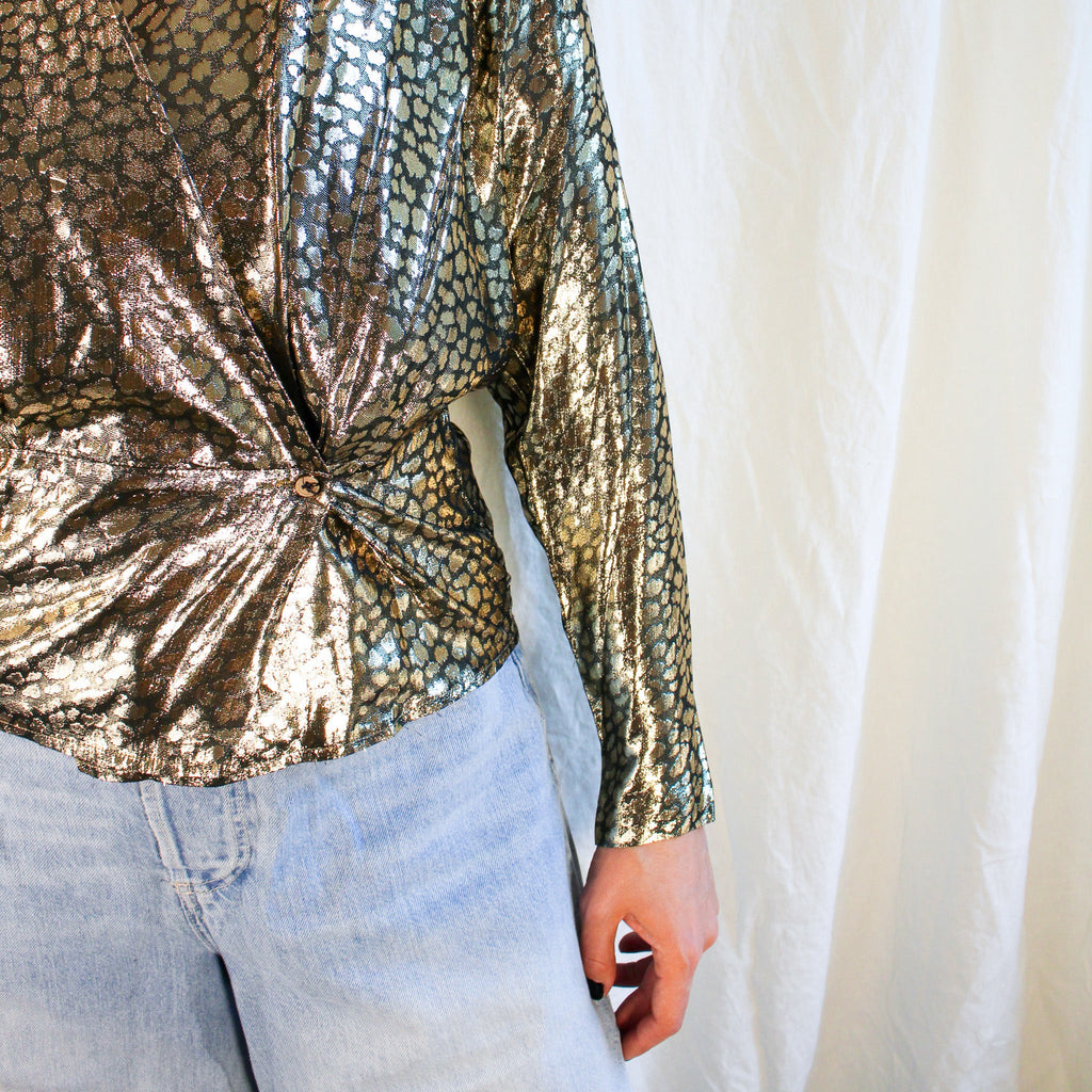 Side ruching ring detail close-up