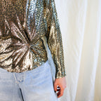 Side ruching ring detail close-up